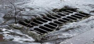 Tragic End to a Commute: Youth Swept Away in Open Drain While Catching Bus; Body Found After 30 Hours